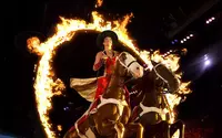 trick rider riding through flames