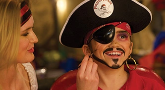 Pirate makeover during Join the Crew experience at Pirates Voyage
