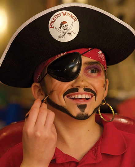 boy with pirate makeover at Pirates Voyage