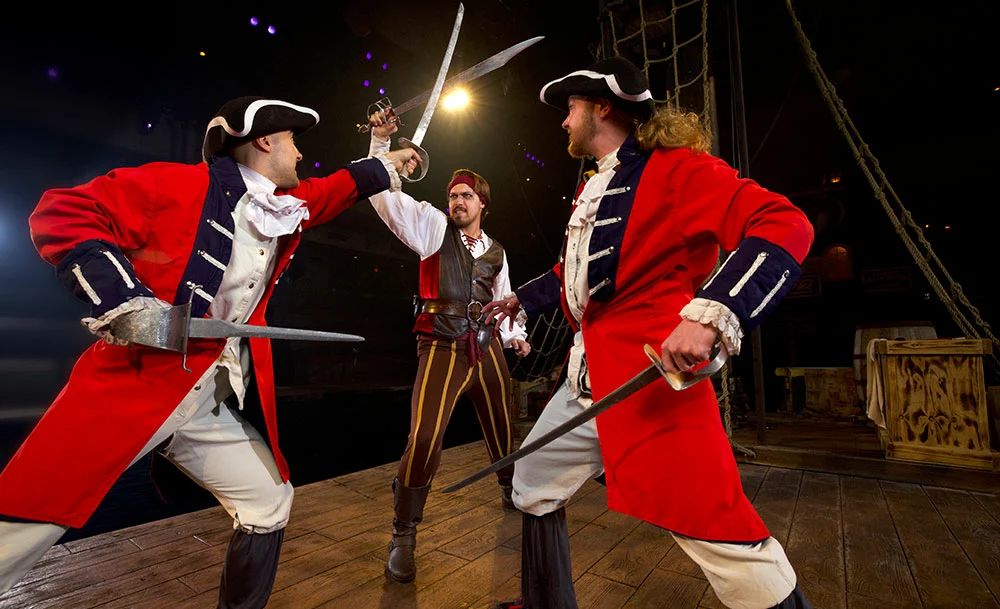 pirates battling on stage at Pirates Voyage Dinner & Show